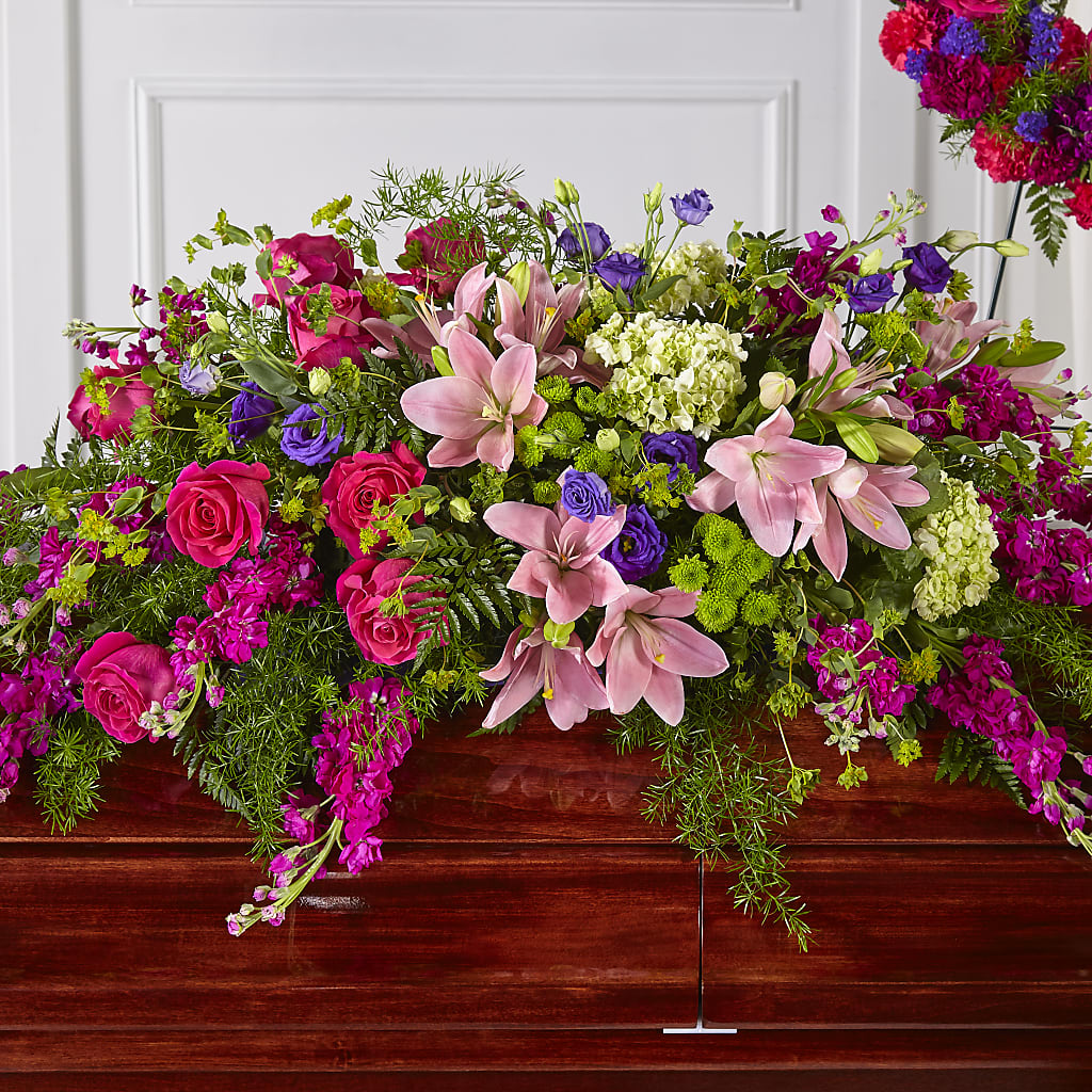 Radiant Tribute Casket Spray – Seminole Flower Shop Inc, Sanford FL